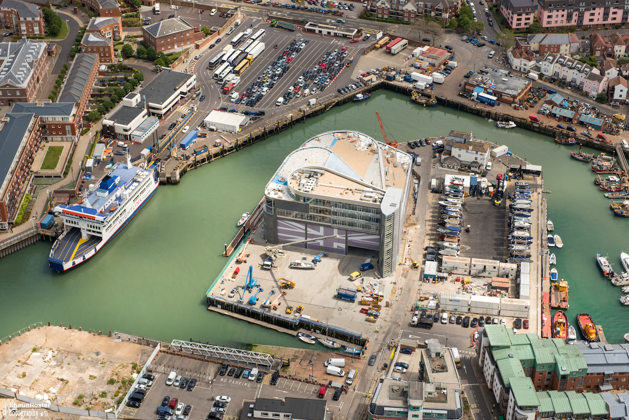 aerial photo of a city near water 