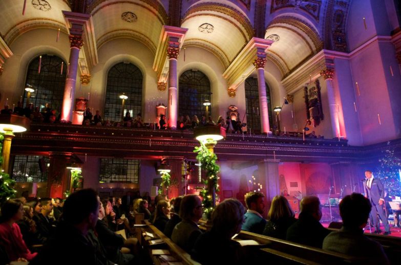 spectators watching an event in a theatre
