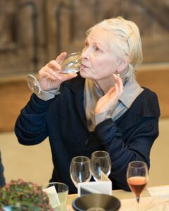 vivienne westwood drinking a glass of wine