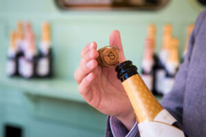 cork being taken out of wine bottle