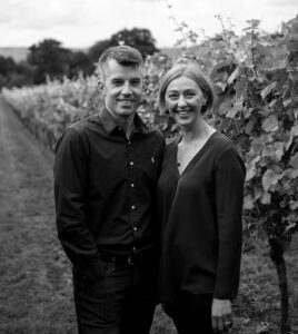 man and woman in vineyard